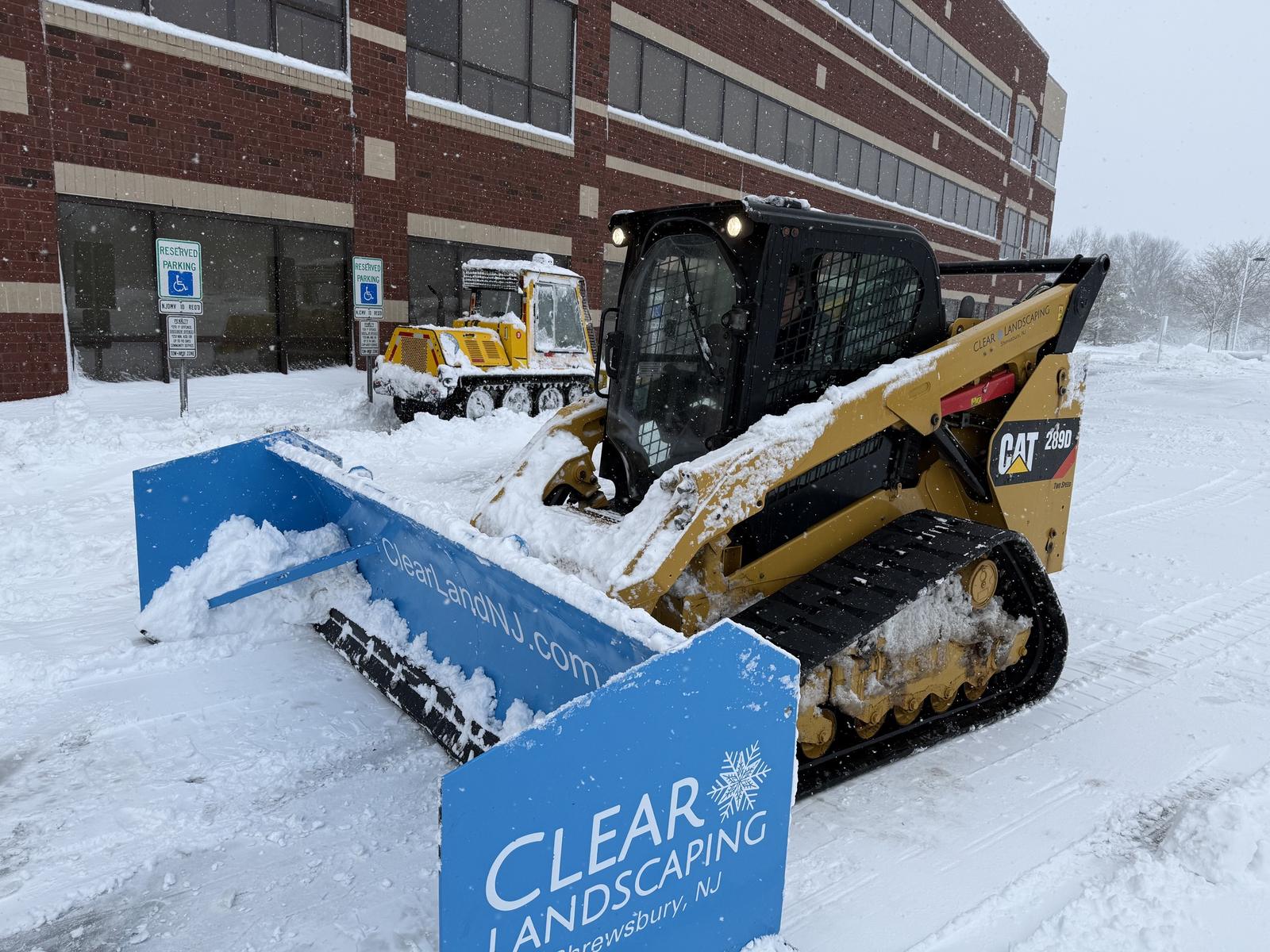 Clear Landscaping plough truck clearing a commercial entrance in New Jersey